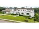 Beautiful home with manicured front lawn and symmetrical landscaping, creating curb appeal at 1640 Kenai Rd, Kennesaw, GA 30152