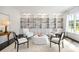 Cozy living room with built-in bookshelves and comfortable seating at 1640 Kenai Rd, Kennesaw, GA 30152