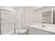 Bathroom with shower and sink at 575 Silver Moon Dr, Loganville, GA 30052