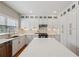 Beautiful kitchen featuring custom cabinets, quartz countertops, and modern appliances at 2508 Haddenham Sw Ln, Smyrna, GA 30082