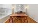 Home office features hardwood floors, a desk, and large window for natural light at 2508 Haddenham Sw Ln, Smyrna, GA 30082