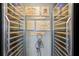 Contemporary wine room featuring custom racking and glass doors to showcase your wine collection at 2508 Haddenham Sw Ln, Smyrna, GA 30082