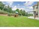 Backyard featuring a play structure and patio area, perfect for outdoor fun and entertaining at 1211 Fawndale Nw Dr, Kennesaw, GA 30152