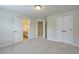 Large bedroom featuring carpet, neutral walls and access to other rooms at 1211 Fawndale Nw Dr, Kennesaw, GA 30152