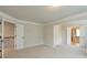 Spacious bedroom features neutral walls, plush carpeting, and multiple entrances at 1211 Fawndale Nw Dr, Kennesaw, GA 30152