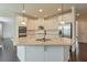 Modern kitchen with granite countertops, stainless steel appliances, and an island with a sink at 1211 Fawndale Nw Dr, Kennesaw, GA 30152