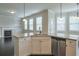 Open concept kitchen features granite counters, an island, stainless appliances, and eat-in breakfast area at 1211 Fawndale Nw Dr, Kennesaw, GA 30152