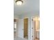 Spacious main bedroom with high ceilings, carpet, and large windows with natural light at 1211 Fawndale Nw Dr, Kennesaw, GA 30152