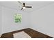 Bright bedroom with ceiling fan and natural light from the window at 1261 Calhoun Sw Ter, Atlanta, GA 30314