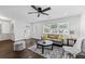 Inviting living room featuring hardwood floors, stylish furniture, and plenty of natural light at 1261 Calhoun Sw Ter, Atlanta, GA 30314