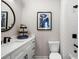Bathroom featuring a vanity, toilet, and a shower/tub combo with a shower curtain at 2328 Mason Drive Dr, Atlanta, GA 30316