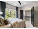 Bedroom featuring a window, closet and neutral color palette at 2328 Mason Drive Dr, Atlanta, GA 30316