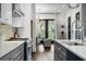 Well-lit kitchen area with an island, stainless steel appliances, and modern countertops at 2328 Mason Drive Dr, Atlanta, GA 30316