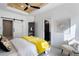 Inviting main bedroom with a wooden ceiling fan, barn door, and bright natural light at 2328 Mason Drive Dr, Atlanta, GA 30316