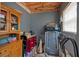 Unfinished basement featuring exposed ceiling, treadmill, and storage cabinet at 127 Muirwood Dr, Temple, GA 30179