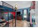 Fun bedroom featuring a bunk bed, neutral wood flooring, and a window for natural light at 127 Muirwood Dr, Temple, GA 30179