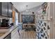 Charming dining area with unique cow print decor and a black picnic-style table at 127 Muirwood Dr, Temple, GA 30179