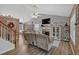 Bright living room featuring a fireplace, comfortable seating, and stylish decor, creating an inviting and cozy space at 127 Muirwood Dr, Temple, GA 30179