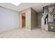 The unfinished basement has a linoleum floor, paneled walls, and access to the home's utilities at 1832 Tree Top Ct, Marietta, GA 30062