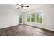 Bedroom with a large window providing an abundance of natural light and tree views at 1832 Tree Top Ct, Marietta, GA 30062