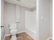 Bathroom featuring a white toilet, shower and white walls at 28 Fawn Ct, Sharpsburg, GA 30277