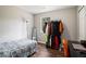 Bedroom featuring a bed, desk, and clothing rack, providing a functional and comfortable space at 28 Fawn Ct, Sharpsburg, GA 30277