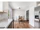 Open kitchen featuring eat-in dining area and stainless-steel refrigerator at 28 Fawn Ct, Sharpsburg, GA 30277