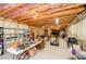 Unfinished basement area, ready to customize, and lots of room for storage and a home gym setup at 4380 Serenity Lake Dr, Cumming, GA 30028