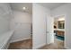 The walk-in closet is ready for your customization and leads to the main bathroom at 4380 Serenity Lake Dr, Cumming, GA 30028