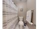 Cozy bathroom featuring a toilet, shower curtain, and tile flooring at 4931 Wilkins Station Dr, Decatur, GA 30035