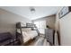 Cozy bedroom featuring a bunk bed, dresser, and neutral decor with durable wood floors at 4931 Wilkins Station Dr, Decatur, GA 30035