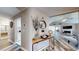 Inviting entryway featuring wood-look floors, a stylish console table, and views into the living area at 4931 Wilkins Station Dr, Decatur, GA 30035