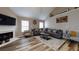 Cozy living room features large sectional and views of yard at 4931 Wilkins Station Dr, Decatur, GA 30035