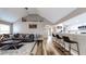 Open-concept living area with kitchen bar, vaulted ceiling, and modern gray decor at 4931 Wilkins Station Dr, Decatur, GA 30035