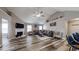 Spacious living room with vaulted ceilings, a fireplace, and luxury vinyl plank flooring at 4931 Wilkins Station Dr, Decatur, GA 30035