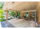Spacious carport featuring brick accents, providing ample covered parking and storage at 5400 Francis Ave, Stone Mountain, GA 30087