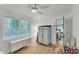 Bright office with hardwood floors, large windows, and a ceiling fan at 5400 Francis Ave, Stone Mountain, GA 30087