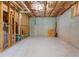 Unfinished basement with framed walls, and exposed utilities at 5003 Pacific Dunes Dr, Suwanee, GA 30024