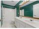 Bathroom featuring dual sinks, tile floor, and shower and tub combination at 5003 Pacific Dunes Dr, Suwanee, GA 30024