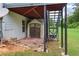 Outdoor backyard shed with brick floor offers extra storage space at 5003 Pacific Dunes Dr, Suwanee, GA 30024