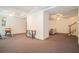Finished basement featuring a neutral carpet and large open space for entertaining or relaxing at 1620 Stonecliff Dr, Decatur, GA 30033