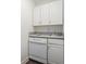 Efficient kitchen space with white cabinets and modern appliances at 1620 Stonecliff Dr, Decatur, GA 30033