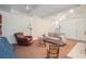A spacious living room with comfortable furnishings, a fireplace, and ample natural light at 1620 Stonecliff Dr, Decatur, GA 30033