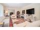 Cozy living room with hardwood floors, elegant furnishings, and ample natural light at 1620 Stonecliff Dr, Decatur, GA 30033