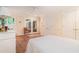Bright main bedroom boasts hardwood floors, a ceiling fan, and ample closet space at 1620 Stonecliff Dr, Decatur, GA 30033