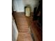 Hardwood bedroom floor with painted white trim, a vintage fan and television at 195 Darla Dr, Woodstock, GA 30188