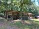 Exterior view of the home from the front showing the porch and covered entrance at 195 Darla Dr, Woodstock, GA 30188