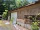 Exterior facade of outbuilding featuring a garage door at 195 Darla Dr, Woodstock, GA 30188
