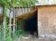 Interior of outbuilding with lumber supports at 195 Darla Dr, Woodstock, GA 30188