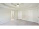 Spacious bedroom featuring a fan and easy access to an ensuite bathroom at 2268 Orleans Ave, Marietta, GA 30062